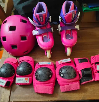 Patines Oxelo rosas y morados con protecciones