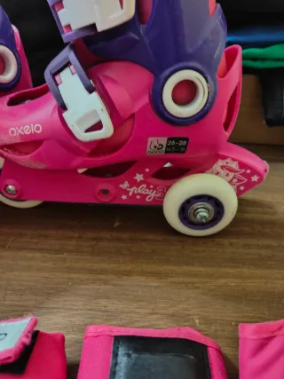 Patines Oxelo rosas y morados con protecciones