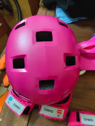 Patines Oxelo rosas y morados con protecciones