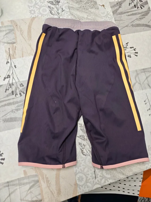 Mallas Adidas Adizero Morado y Rosa