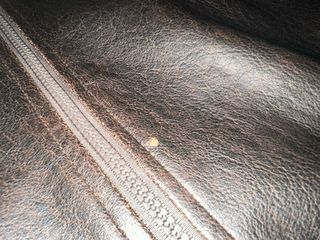 Chaqueta efecto piel y tejido marrón