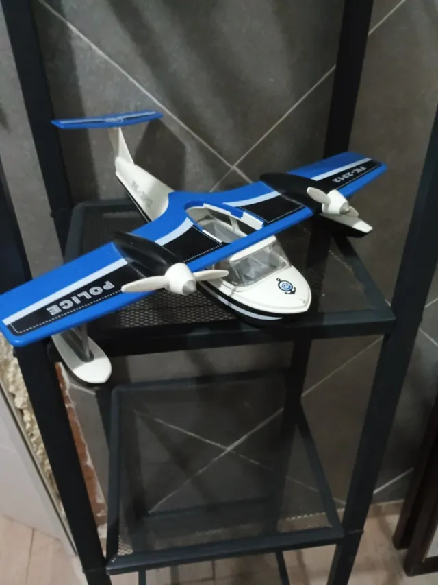 Avión Policía Azul y Blanco