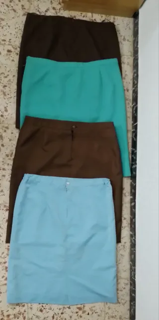 Lote 4 faldas 52 turquesa, azul y marrón