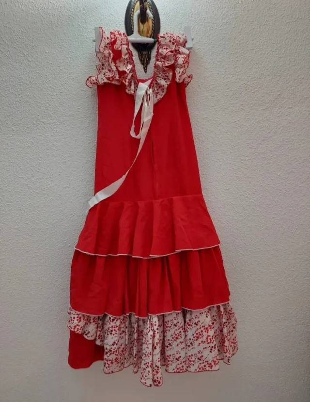Traje de flamenca rojo con volantes