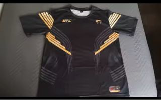 Camiseta UFC Negra y Dorada (talla a elegir)