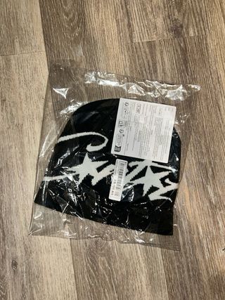 Cuffia Corteiz Nera con Logo Bianco