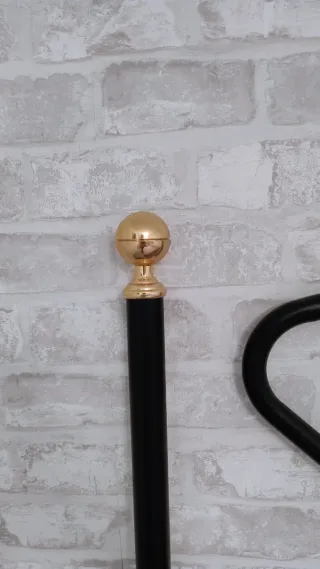 Cabecero de forja negro y dorado