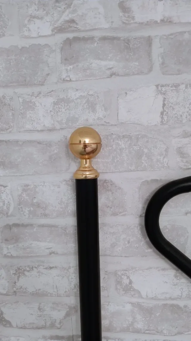 Cabecero de forja negro y dorado