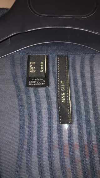 Camisa azul con lazada