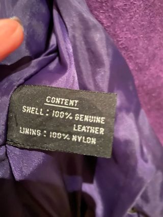 Chaqueta ante morada M flecos