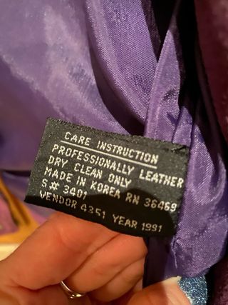 Chaqueta ante morada M flecos