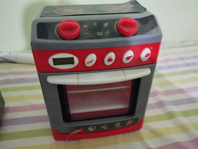 Lote de juguetes: cocina, teléfono, tren