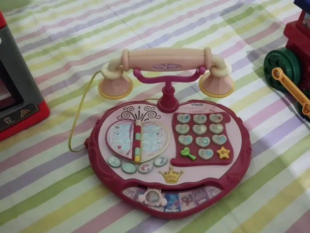 Lote de juguetes: cocina, teléfono, tren