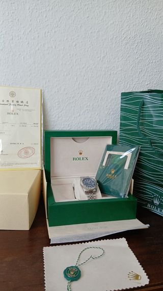 Reloj Rolex Azul y Plateado