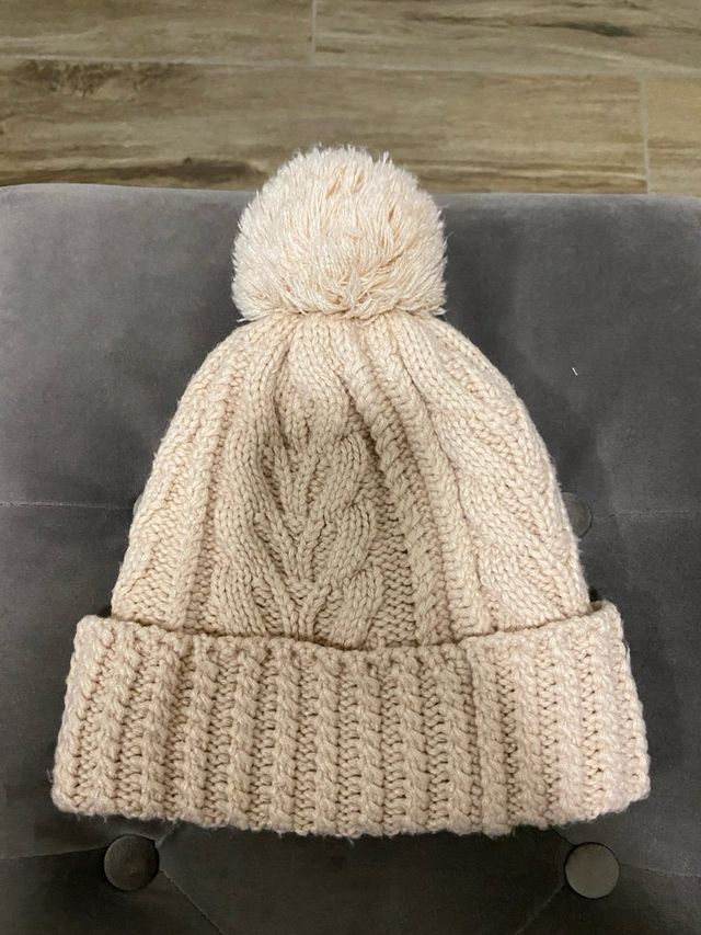 Berretto Timberland con pompon e trecce