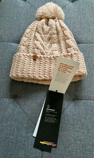 Berretto Timberland con pompon e trecce