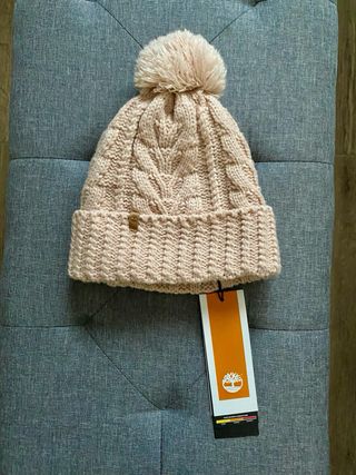 Berretto Timberland con pompon e trecce