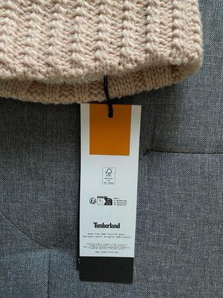 Berretto Timberland con pompon e trecce