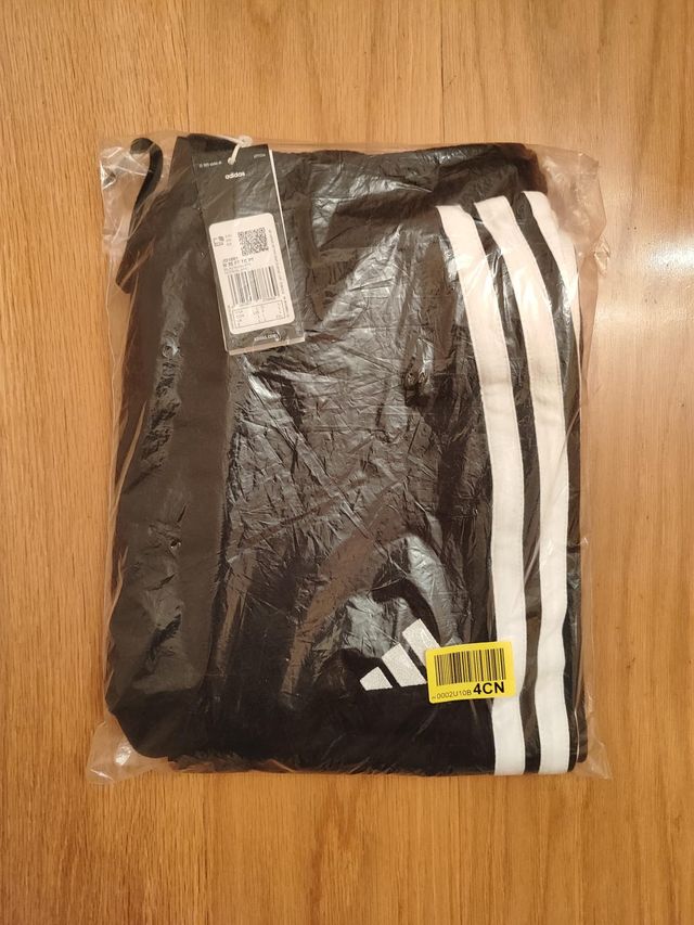 Pantalones Adidas negros con rayas