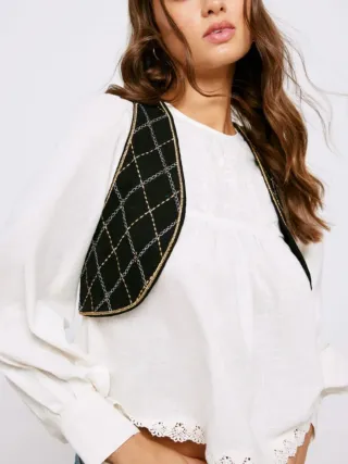 Chaleco High Spirits T. L negro y dorado