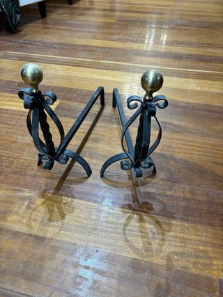 Morillos para chimenea metal negro y dorado