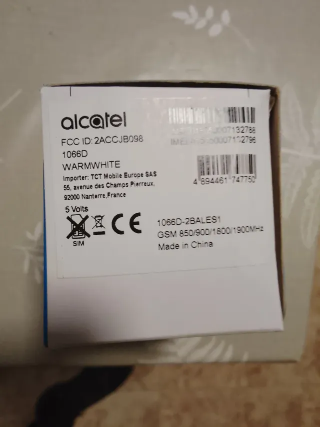 Alcatel 1066D con 2 SIM, cavo e auricolari