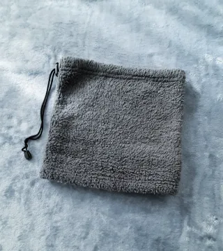 Scaldacollo in pellicciotto grigio