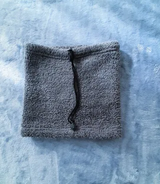 Scaldacollo in pellicciotto grigio