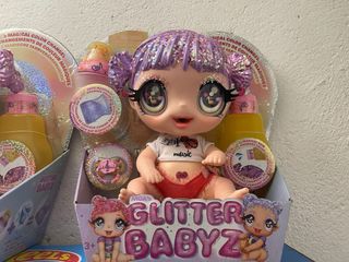 MGA Glitter Babyz Muñeca Morada