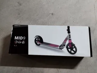 Patinete infantil rosa y plateado