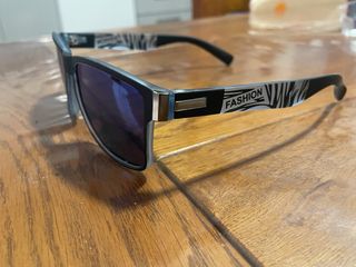 Gafas de sol hombre negras y plateadas