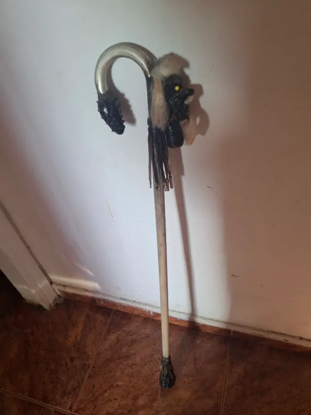 Bastón sciamanico, mantiene la polvere