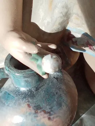 Figura Lladro cerámica mate chica con cántaro