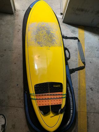 Tabla de surf Donald Takayama y funda de viaje