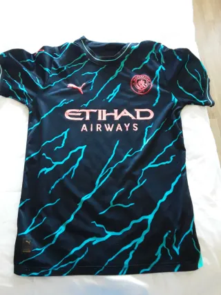 Camiseta Puma Negra y Turquesa