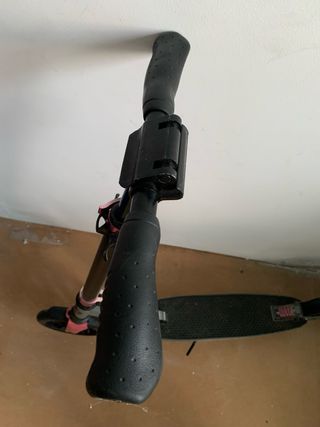 Patinete Oxelo gris y rosa .