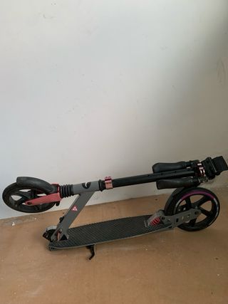 Patinete Oxelo gris y rosa .