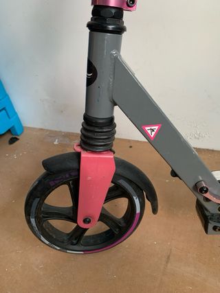 Patinete Oxelo gris y rosa .