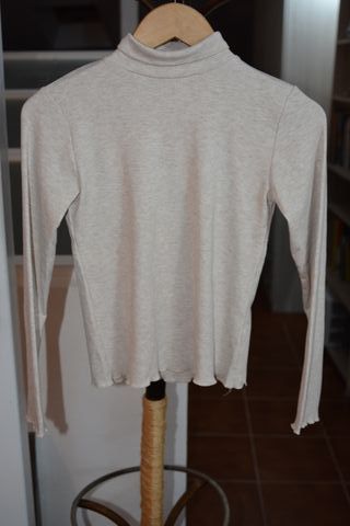 Jersey de cuello alto color hueso