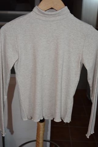 Jersey de cuello alto color hueso