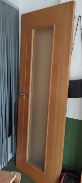 Puerta de salón con cristal