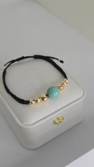 Bracciale in oro 18K con smeralda tipo murraya