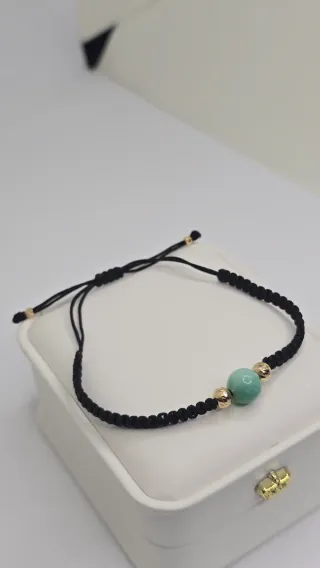 Bracciale in oro 18K con smeralda tipo murraya