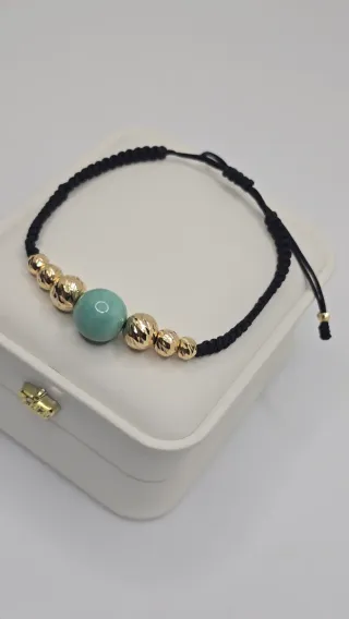 Bracciale in oro 18K con smeralda tipo murraya