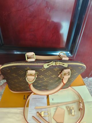 Louis Vuitton Alma BB Leather Handbag