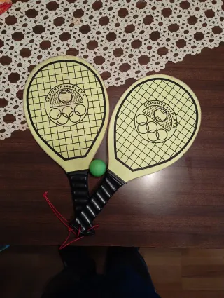 Raquetas de playa con pelota