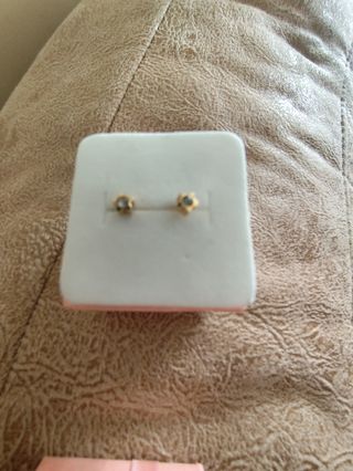 Pendientes niña flor dorados