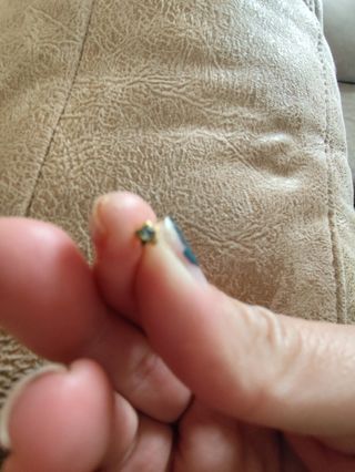 Pendientes niña flor dorados