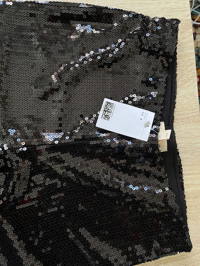 Pantalones de lentejuelas negros y plateados