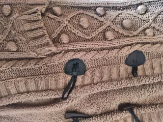 Abrigo borreguero con botones